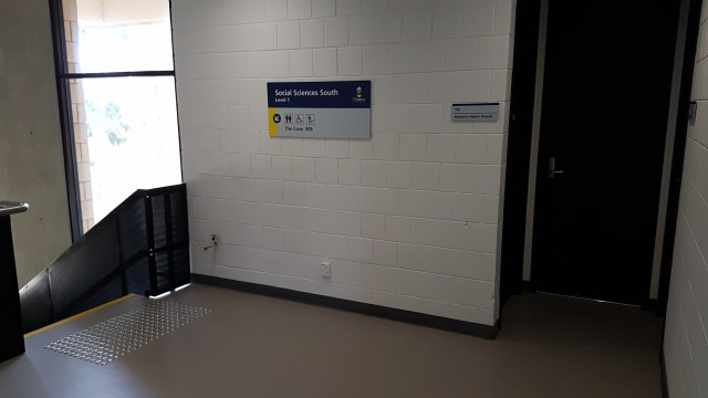 Rooms 102 and 103 on the southwest staircase