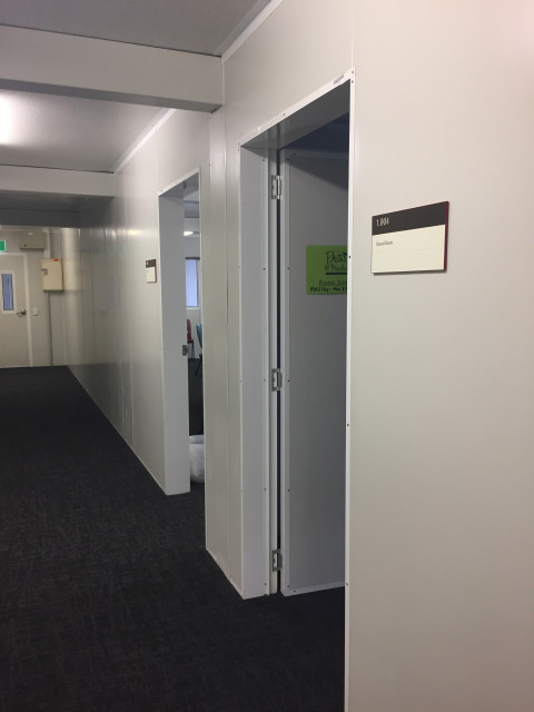 Second door from the west entrance