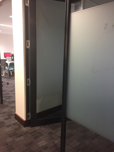 Second entrance, further down the hallway on the right.