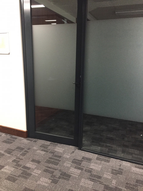 Second entrance, located further down the hall on the right.