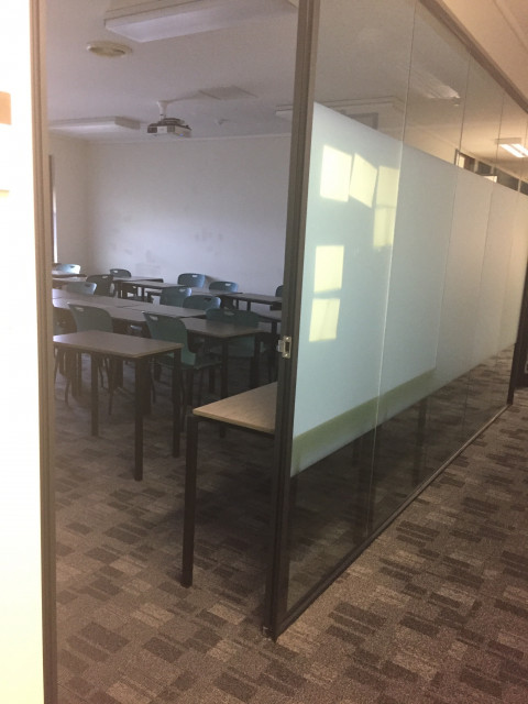 Second entrance located further down the hallway on the right.