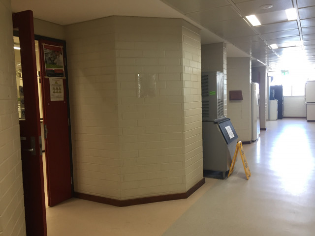 Second entrance located further down the hall