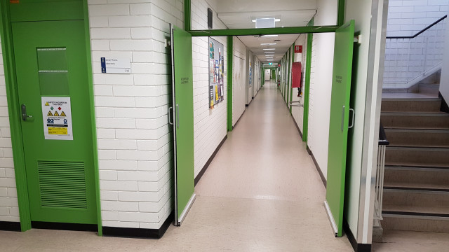 Senior physics laboratory 216 beside the northwest stairs.