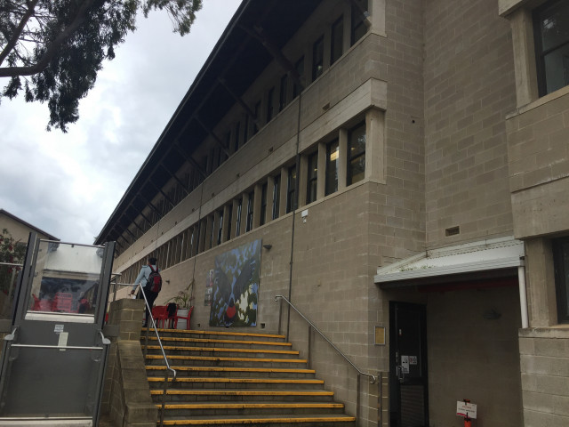 South wing entrance opposite the pop up ref