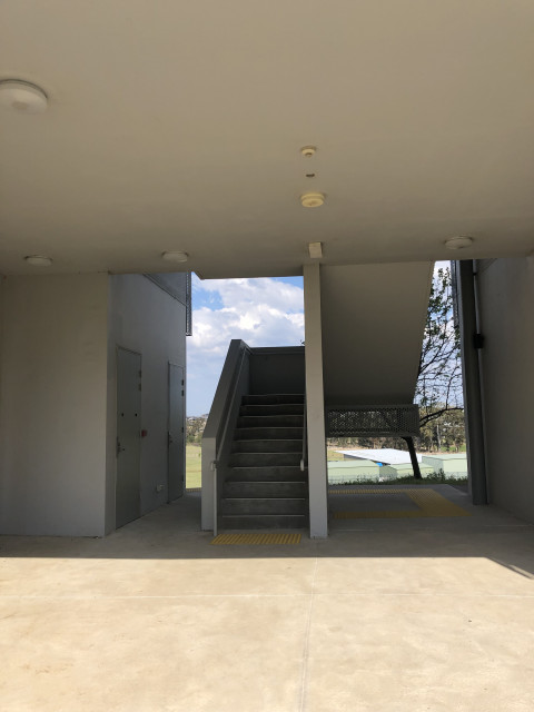 Stairs in middle of building to all levels