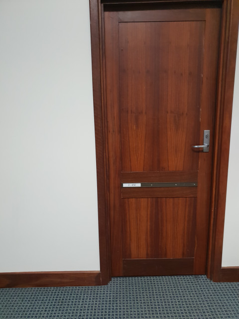 Straight through the doors next to the stairs