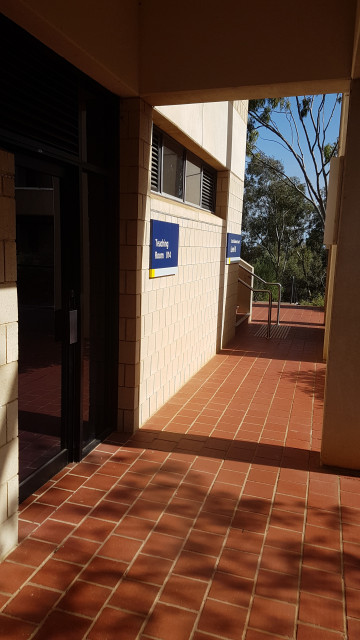 Teaching room 014 right beside staircase to SSS courtyard