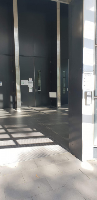 The doors to 1.01. The rightmost door is the most commonly used entrance