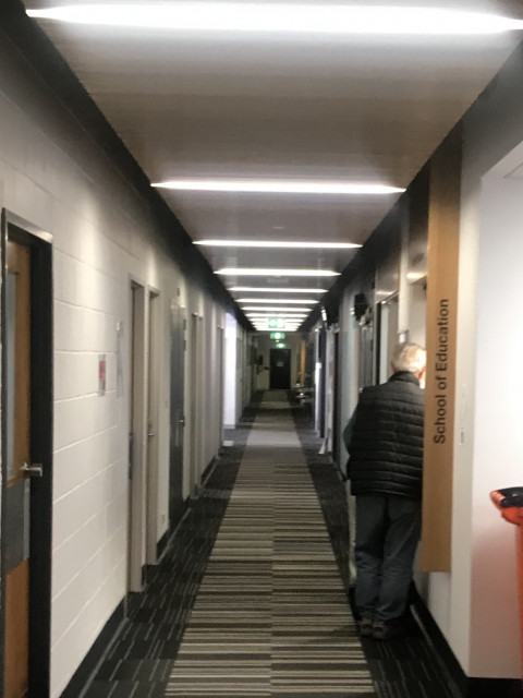 The office is located down the hallway to the right of the entrance left of the hallway
