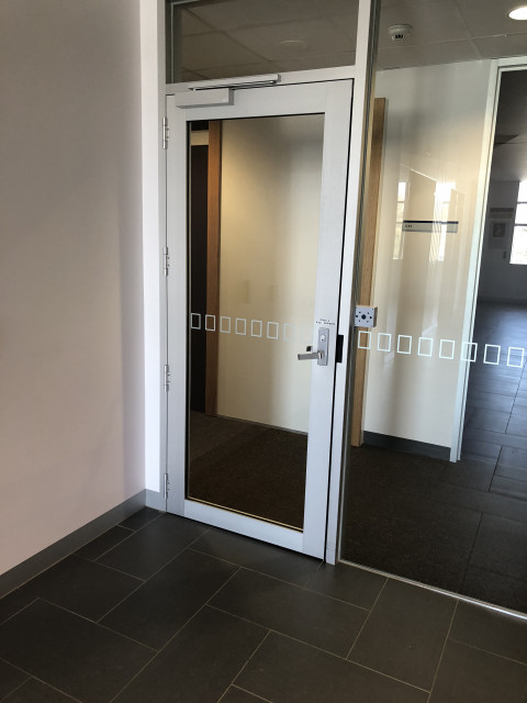 Through this door from lifts
