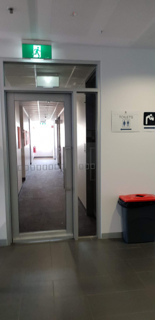 Toilets are via this corridor