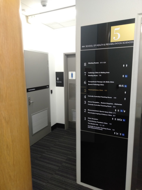 Toilets behind lift
