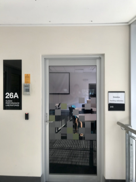 View of the room entry. This photo is taken from the 26A entry within Building 26.