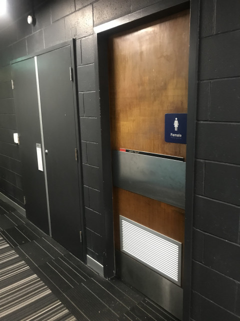 View of the toilet right next to the bubbler