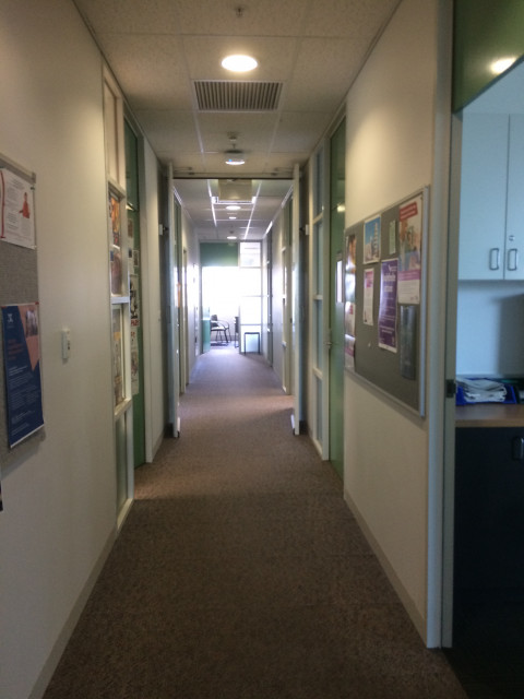 Walk down this hallway, and turn left at the end