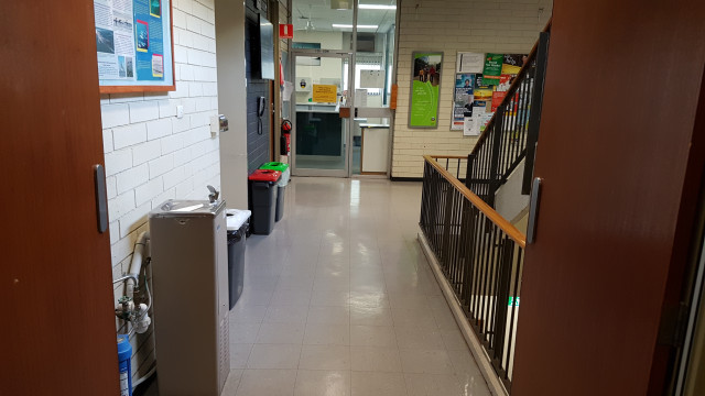 Water bubbler by the southeast staircase from the south corridor.