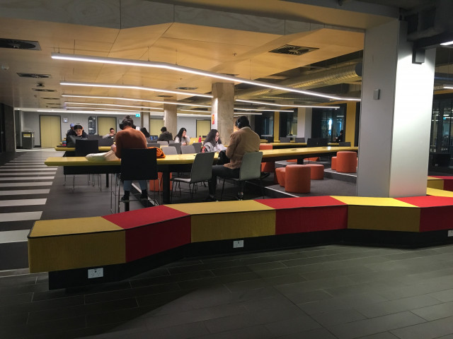You can't miss these long yellow tables, they take over the room.